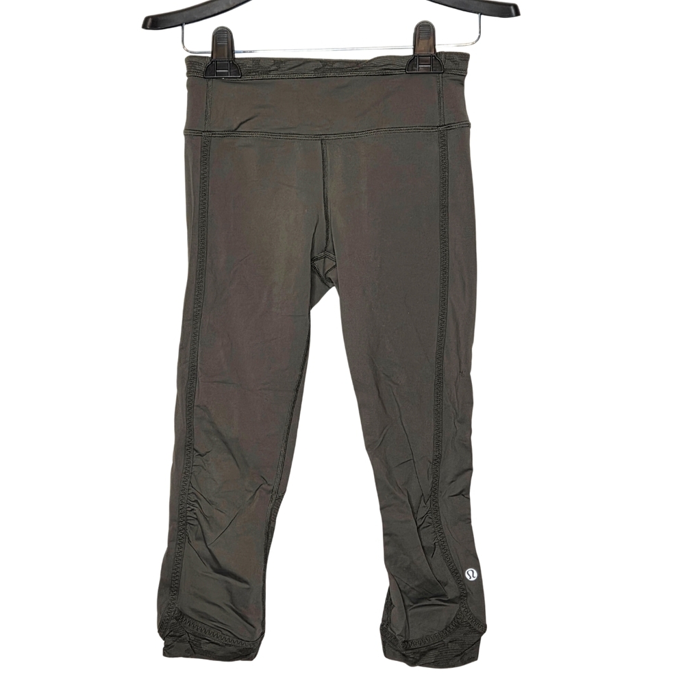Lululemon Olive Green Crop Leggings Size 2 Camo Mesh Trim Zip Pocket